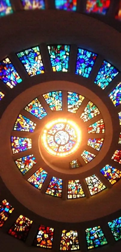 Vibrant stained glass spiral with vivid colors and intricate patterns.