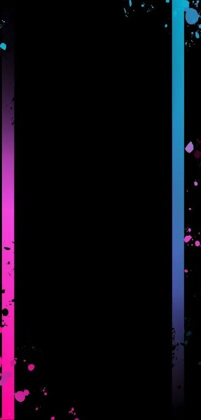 Colorful pink and blue splatter wallpaper on dark background.