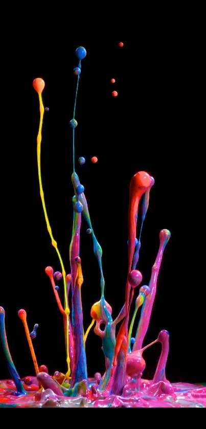 Colorful paint splash on black wallpaper background.