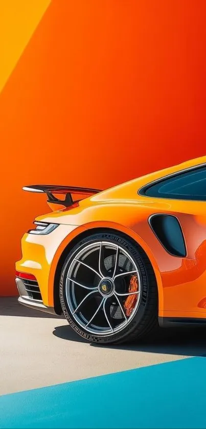 Orange sports car with vibrant background.