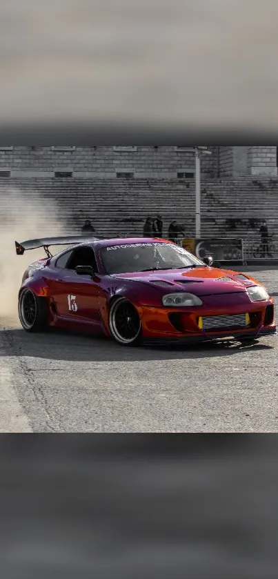 Red and vibrant sports car in motion on urban street.