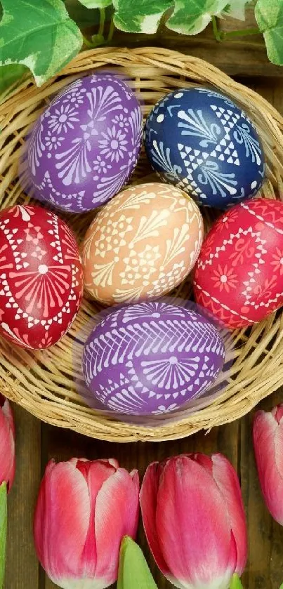 Colorful Easter eggs in a basket with tulips and ivy in the background.