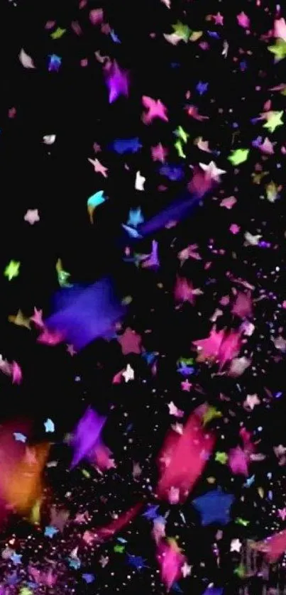 Colorful star confetti bursts on black background wallpaper.