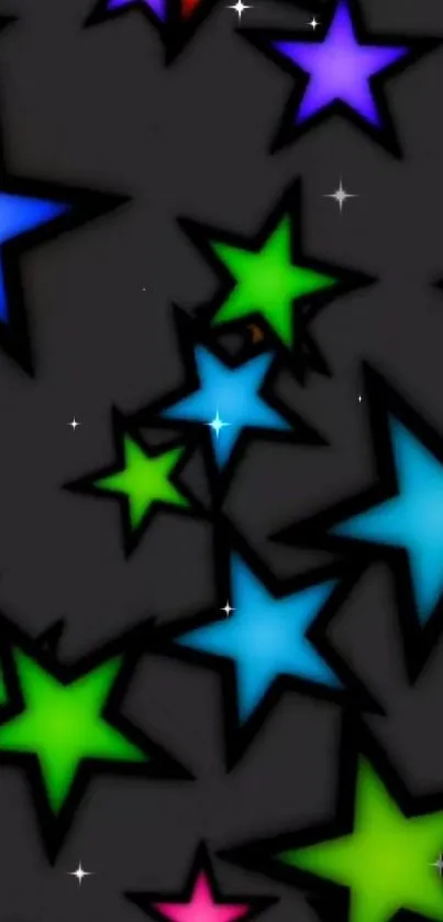 Vibrant starry night wallpaper with colorful stars on a black background.