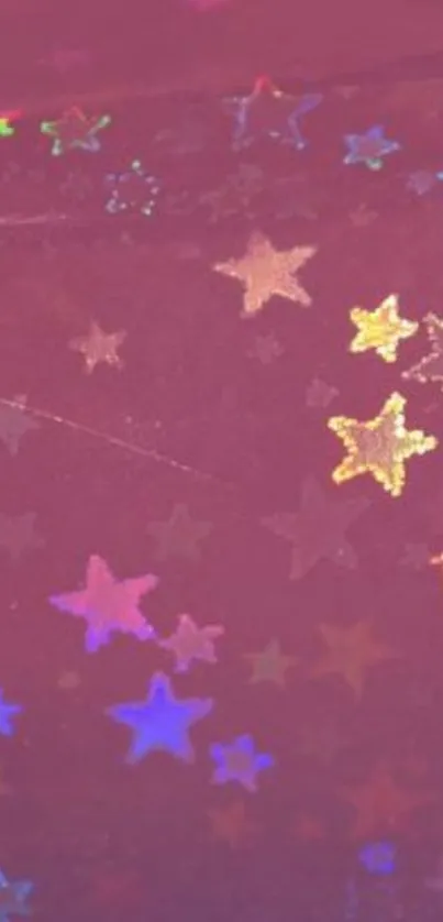 Vibrant pink wallpaper with colorful holographic stars.