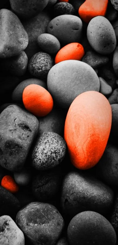 Vibrant orange stones on grayscale background wallpaper.