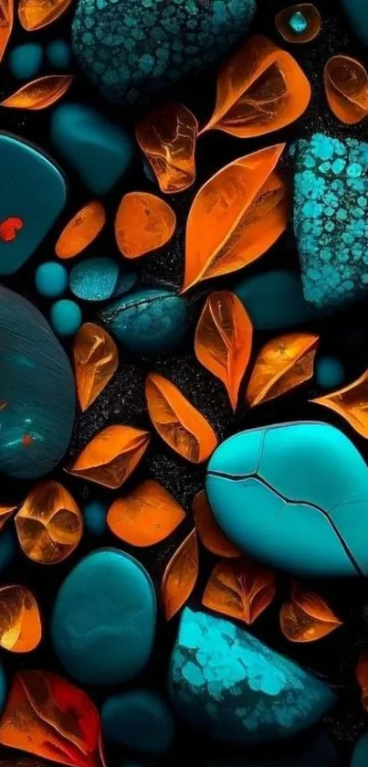 Vibrant teal stones and orange leaves on black background.