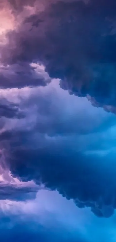 Dynamic storm clouds with vibrant lightning and blue hues for mobile wallpaper.