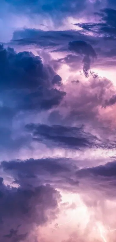 Purple and blue stormy clouds in the sky wallpaper.