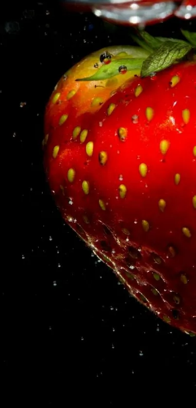 Close-up of a vibrant red strawberry against a black background.