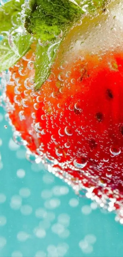 Close-up of a strawberry with sparkling bubbles on a teal background, adding vibrancy.