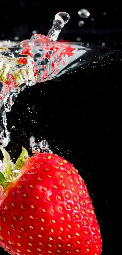 Red strawberry splashing into water with vibrant colors and dynamic motion.