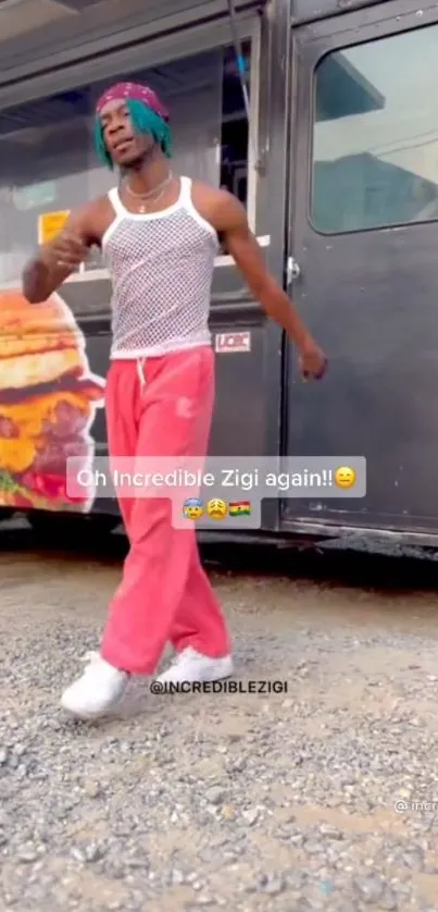 Street dancer in vibrant pose with food truck background.