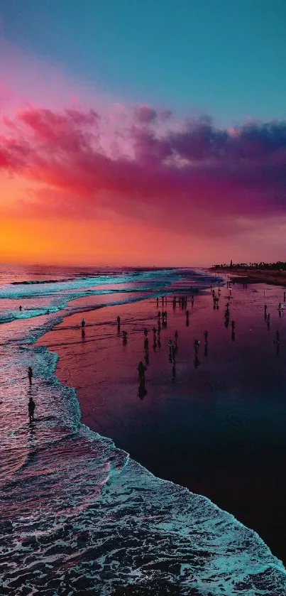 Vibrant sunset over a serene beach with waves.