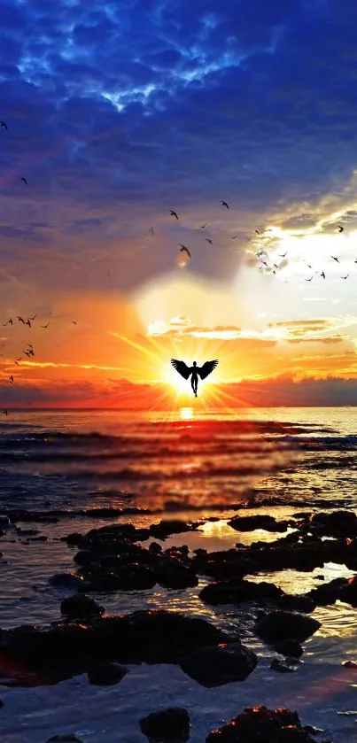 Sunset beach wallpaper with colorful sky and birds over the ocean.