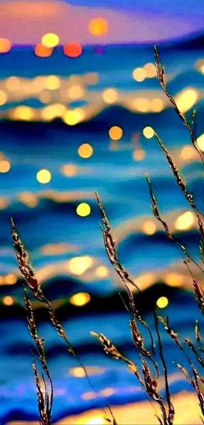 Vibrant sunset on a serene beach with golden light reflections on the ocean.