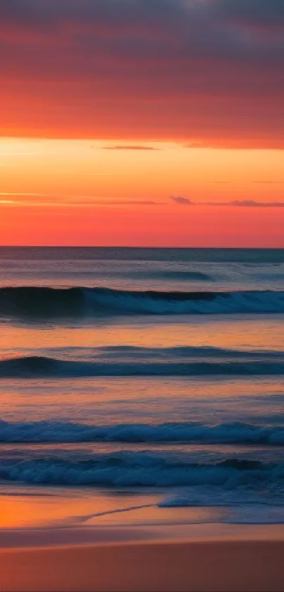 A serene sunset over calm ocean waves on a vibrant beach landscape.