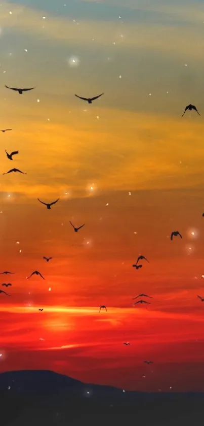 Bird silhouettes against vibrant sunset sky.