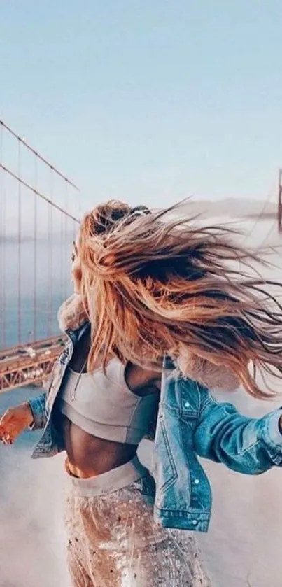 Hair flowing at sunset near Golden Gate Bridge.