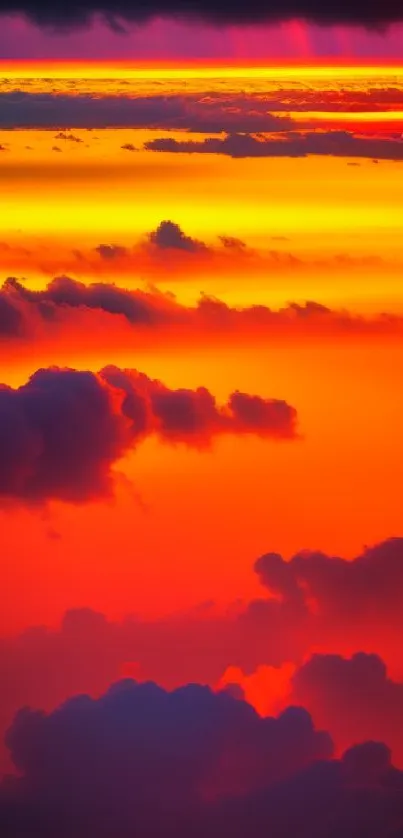 Vibrant orange and purple sunset cloudscape wallpaper.