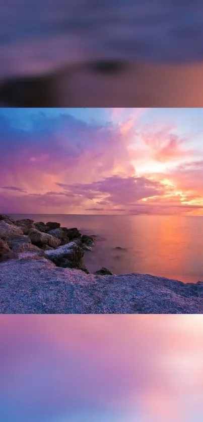 Vibrant sunset over ocean with rocky shore and colorful sky.