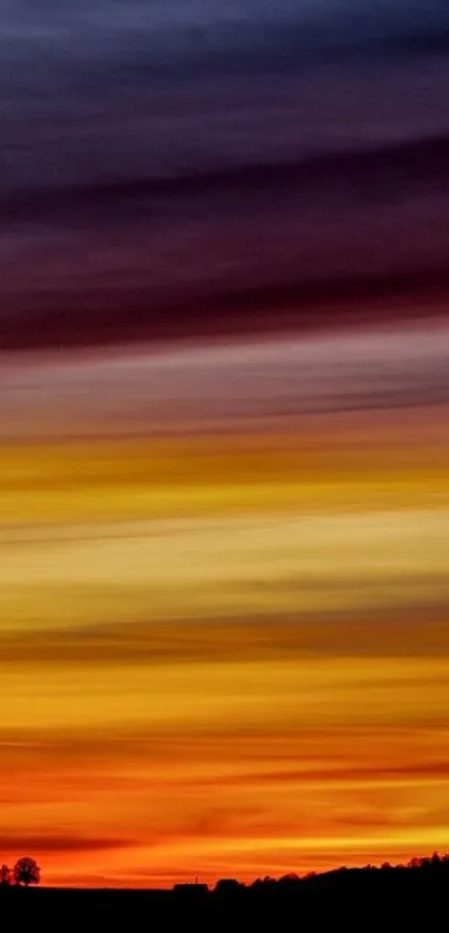 Vibrant sunset gradient wallpaper with rich oranges and purples.