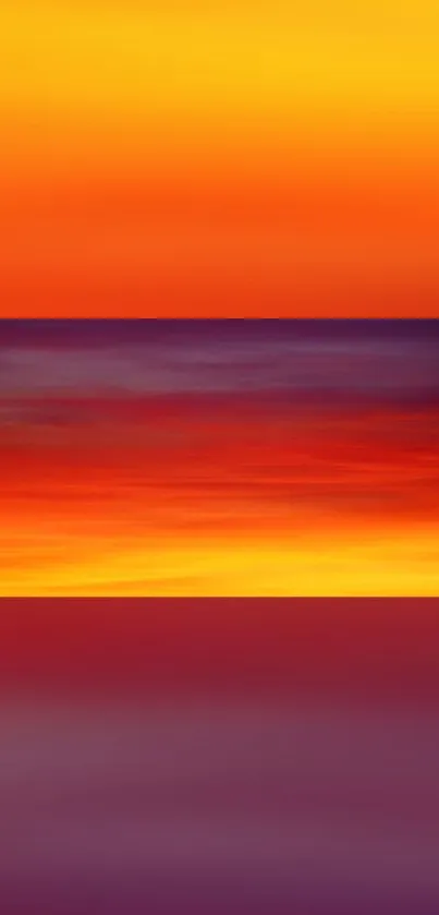 Vibrant sunset gradient wallpaper with warm orange, red, and purple hues.