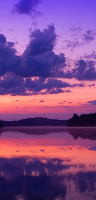 A vibrant sunset over a serene lake, with purple and pink cloudy sky reflections.