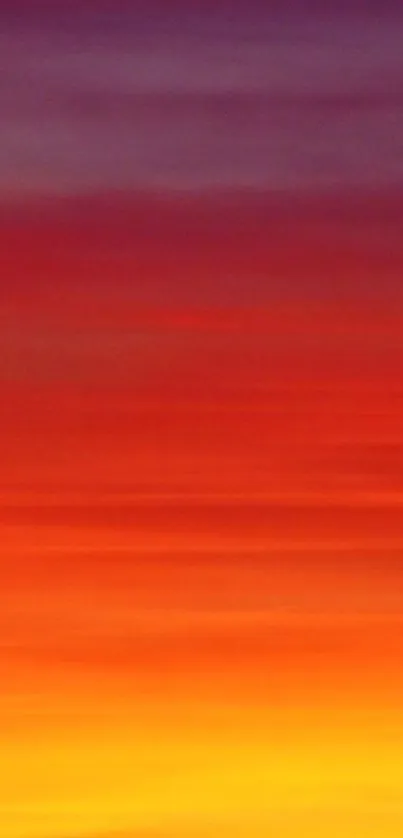 Vibrant sunset gradient wallpaper with orange and red hues.