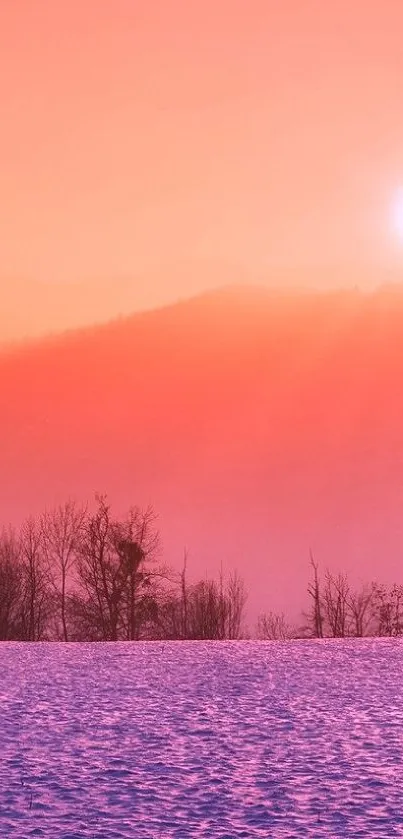 Vibrant sunset over snow-covered mountains wallpaper