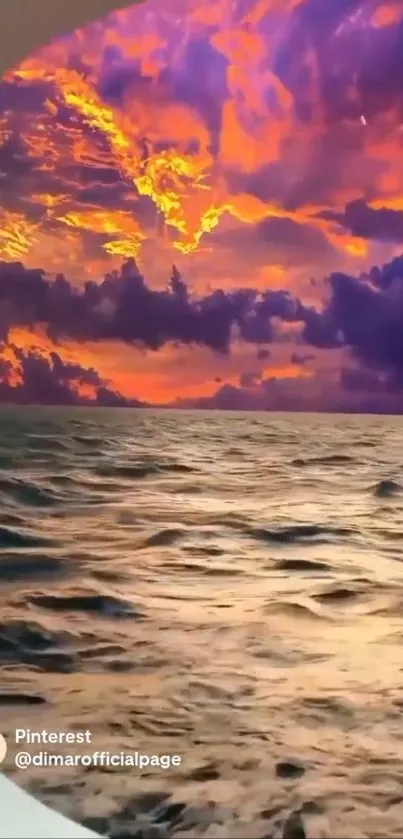 Vibrant ocean sunset with colorful clouds.