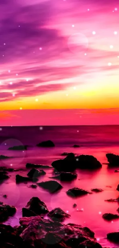 Vibrant sunset over ocean with rocks and vivid colors.