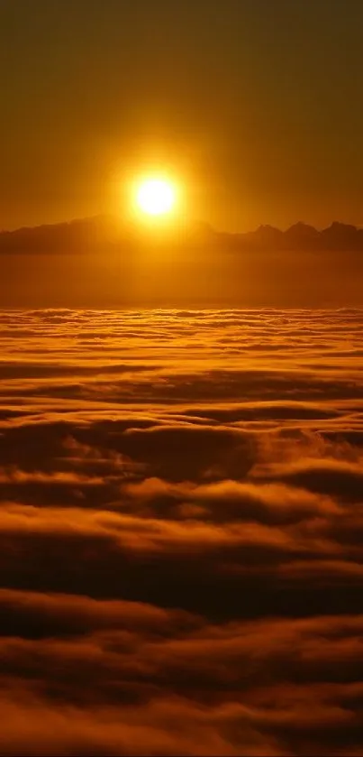 Vibrant sunset over clouds with glowing sky.