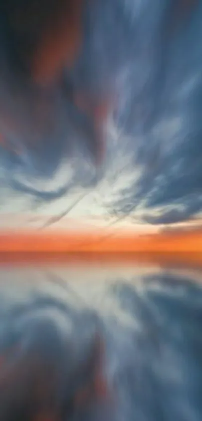 Vibrant sunset sky reflected over calm water, creating an artistic mobile wallpaper.