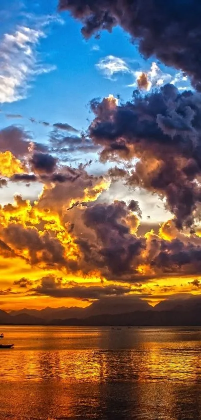 Dramatic sunset sky with vibrant orange and blue hues reflecting on water.