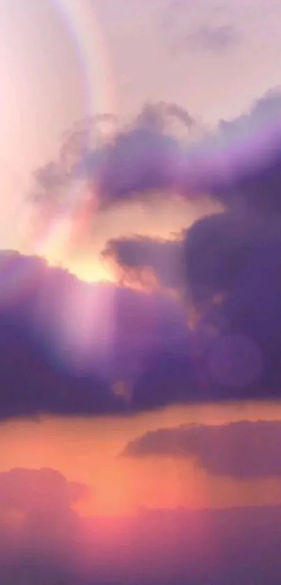 Dynamic sunset wallpaper with purple and orange hues over a cloudy sky.