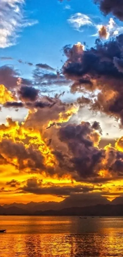 Stunning sunset sky with vibrant orange and blue hues over calm water.