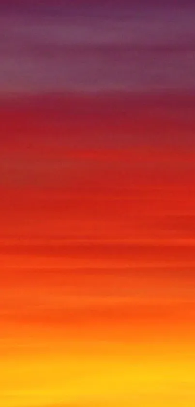 Vibrant sunset sky mobile wallpaper with orange, red, and purple gradients.