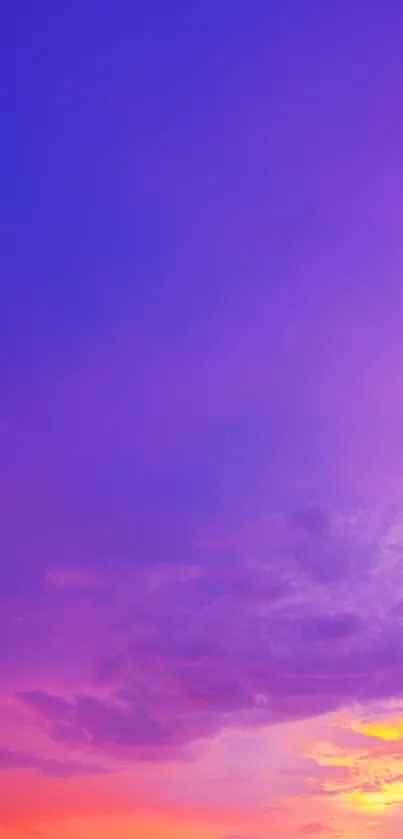 Vibrant sunset sky with purple and pink hues and cloud formations.