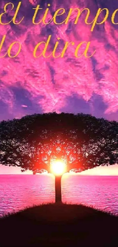 Silhouette of tree against vibrant pink sunset over water.