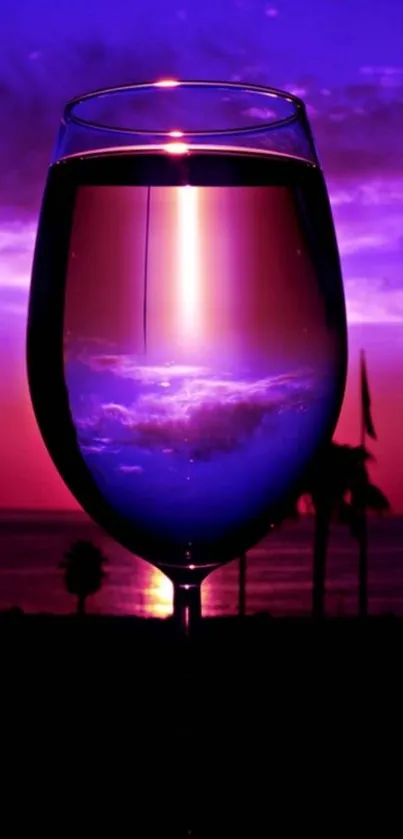 Purple sunset through a wine glass, ocean view.