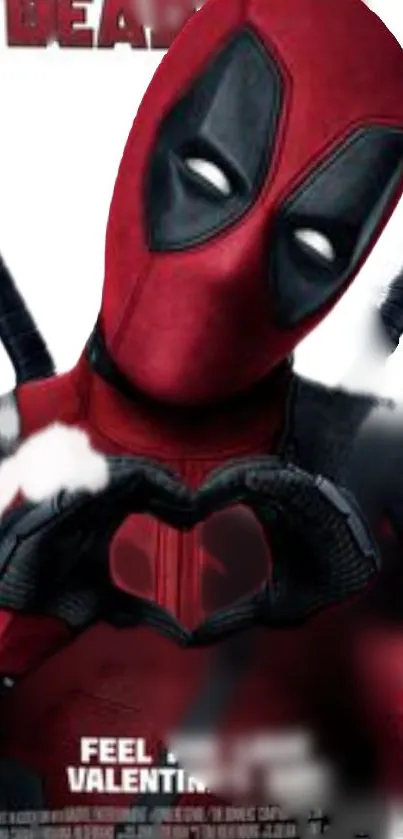 Hero in red and black costume making a heart gesture.