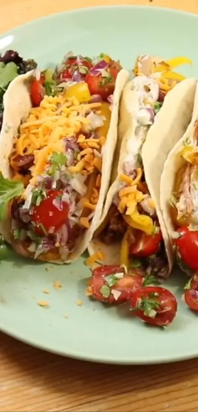 Colorful tacos on a green plate with fresh ingredients.