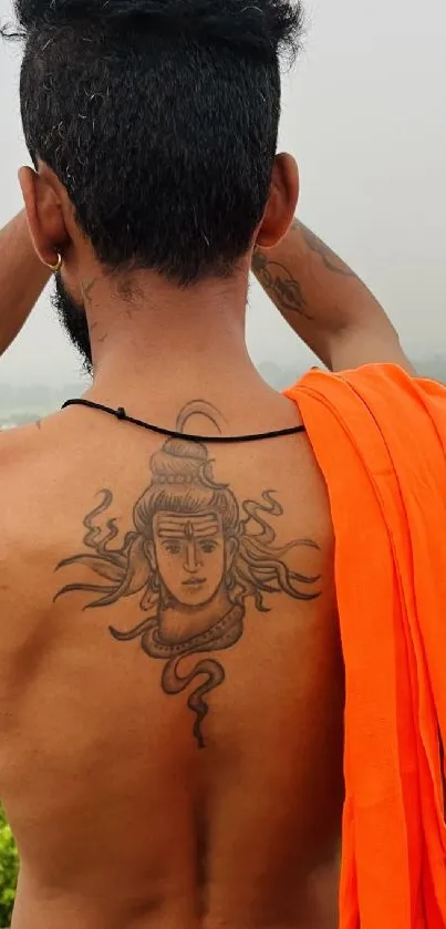 Back tattoo with orange cloth mobile wallpaper