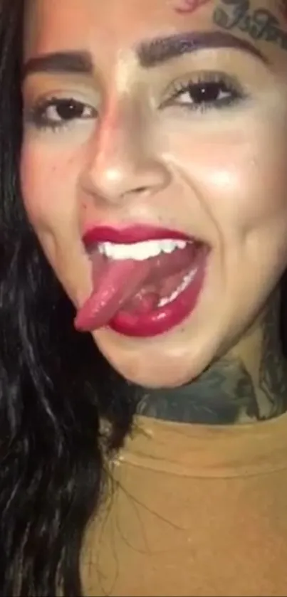 Vibrant portrait of a tattooed woman with dynamic facial expression.