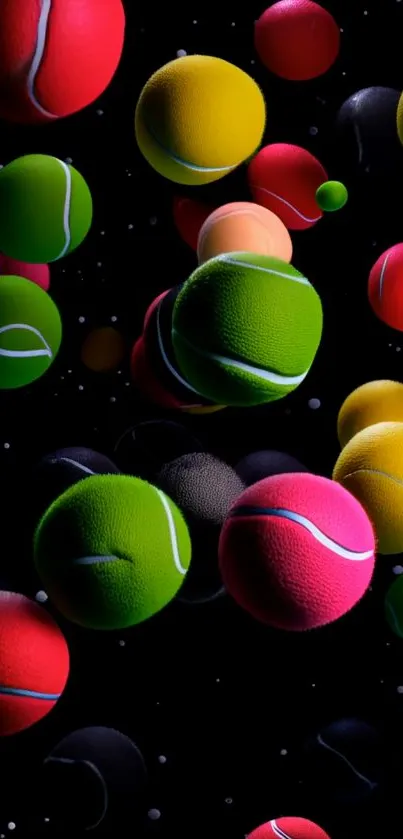 Colorful tennis balls floating against black background.