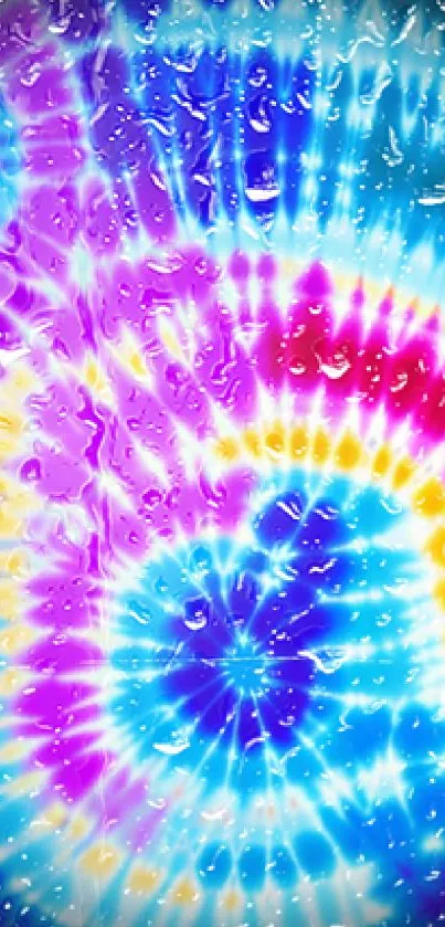 Vibrant spiral tie-dye pattern in blue, purple, and yellow hues.
