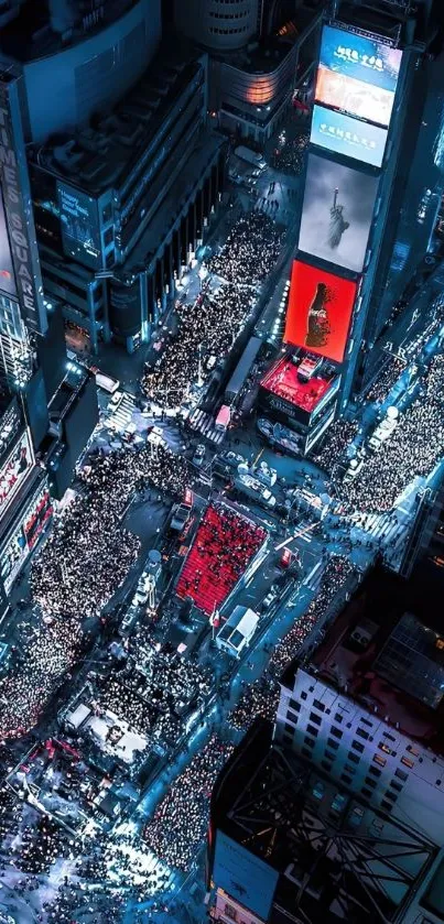 Times Square aerial view at night with vibrant lights and bustling crowds.