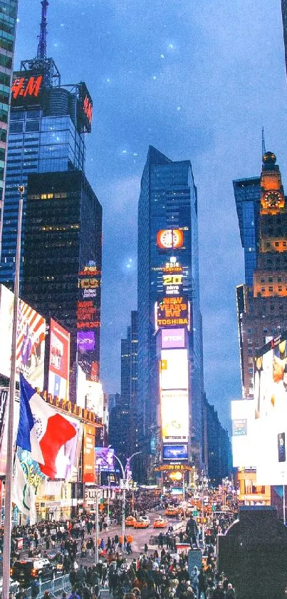 Times Square buzzing with lights and crowd.