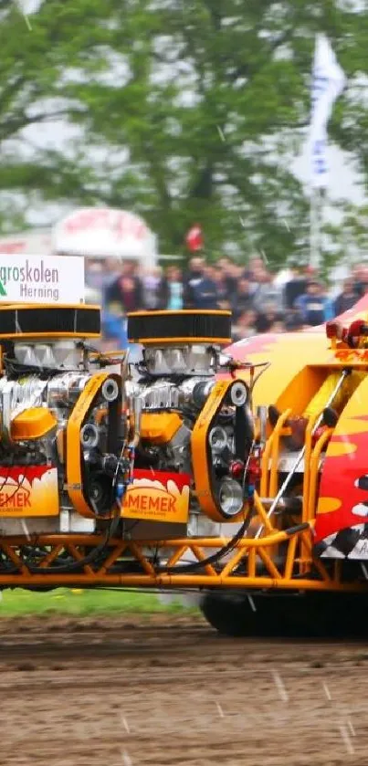 Yellow tractor pulling competition with vibrant crowd.